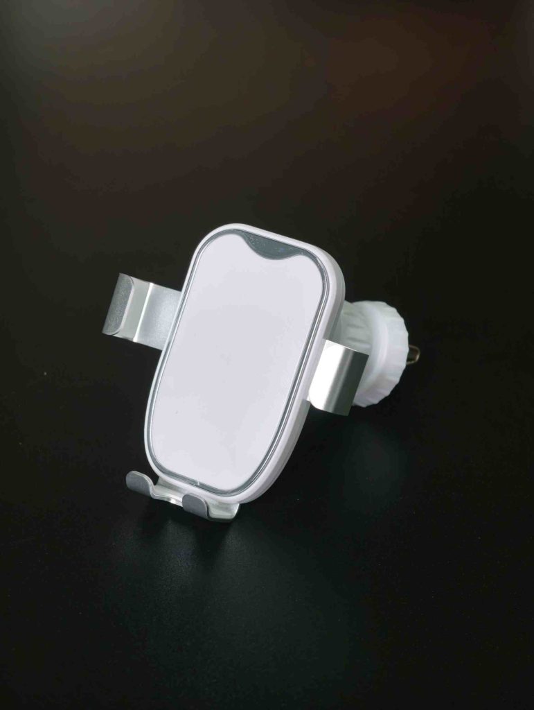 White car air vent phone holder with adjustable side arms
