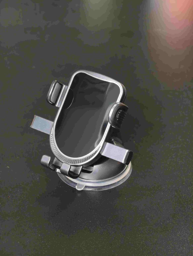 Suction cup car phone holder for dashboard and windshield mounting